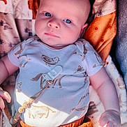 Cameron is registered to the contest to win money with this photo: baby, bald_head, blanket, blue_eyes, child, chubby_cheeks, clothing, cozy, cute, hand, infant, looking_up, lying_down, onesie, orange_pants, pacifier_clip, pattern_print, portrait, soft_light, swaddle