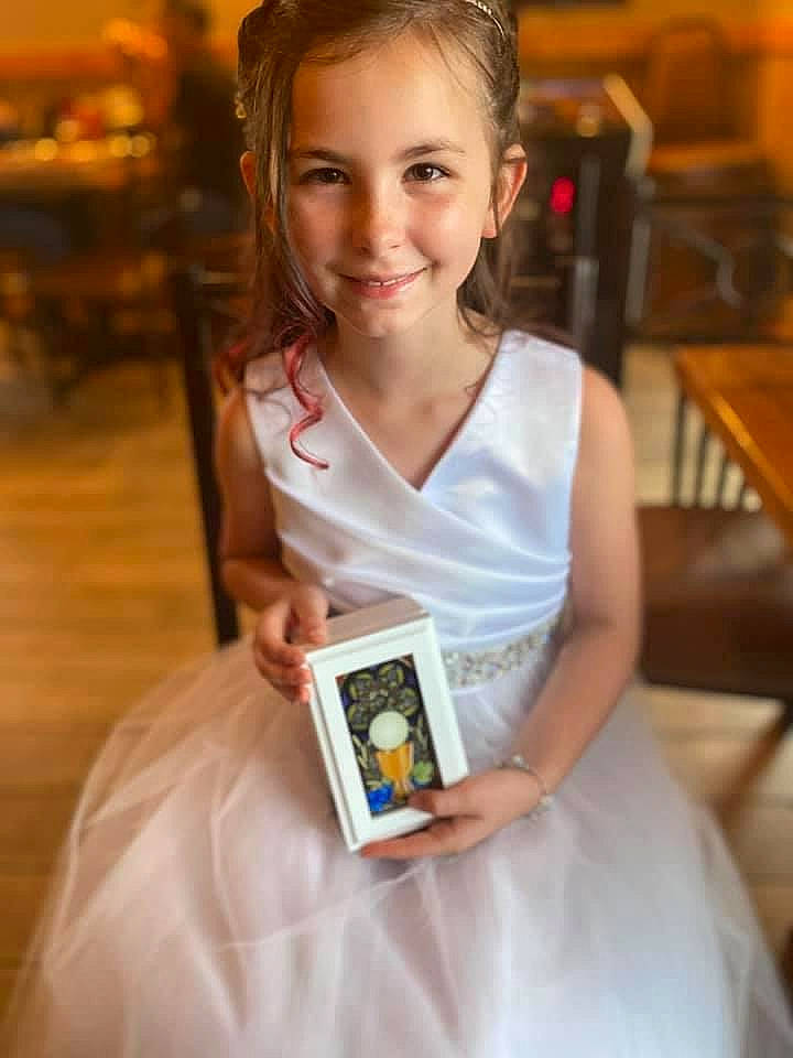 Rosalynn is registered to the contest to win money with this photo: bride, ceremony, child, child_model, electronic_device, gadget, joy, person, technology