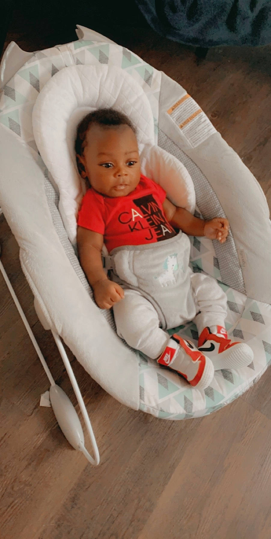 Kylan is registered to the contest to win money with this photo: baby, baby_products, baby_safety, baby_sleeping, baby_toddler_clothing, child, comfort, infant_bed, person, plastic, product, sock, toddler, walking_shoe