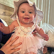 Nova joined the competition — help win amazing prizes! baby, child, tutu, dress, hat, smiling, indoor, hands, person, pink, cute, happy, face, portrait, sitting, clothing, headwear, skin, infant, young