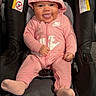 baby, child, infant, car_seat, pink_outfit, hat, hood, nike, smiling, tongue_out, sitting, plush_toys, vehicle_interior, portrait, full_body, fashion, happy, indoor, safety_harness, sock