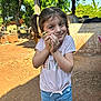 Valentina Rose joined the competition — help win amazing prizes! child, girl, chick, animal, pigtails, outdoor, sunlight, dirt, farm, nature, smile, happy, holding, shorts, tshirt, cute, portrait, playful, young, daylight