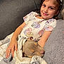 Valentina Rose joined the competition — help win amazing prizes! child, girl, puppy, dog, blanket, couch, smile, braids, headband, sleeping_dog, indoor, cozy, comfort, pet, young, happy, casual_clothing, relaxation, home, toddler
