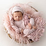 Eloise joined the competition — help win amazing prizes! baby, basket, blanket, bunny, cozy, curled_up, feet, hatted, indoors, infant, knit_blanket, newborn, newborn_photography, onesie, peaceful, pink, plush_toy, portrait, sleeping, soft_lighting