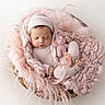 baby, basket, blanket, bunny, cozy, curled_up, feet, hatted, indoors, infant, knit_blanket, newborn, newborn_photography, onesie, peaceful, pink, plush_toy, portrait, sleeping, soft_lighting