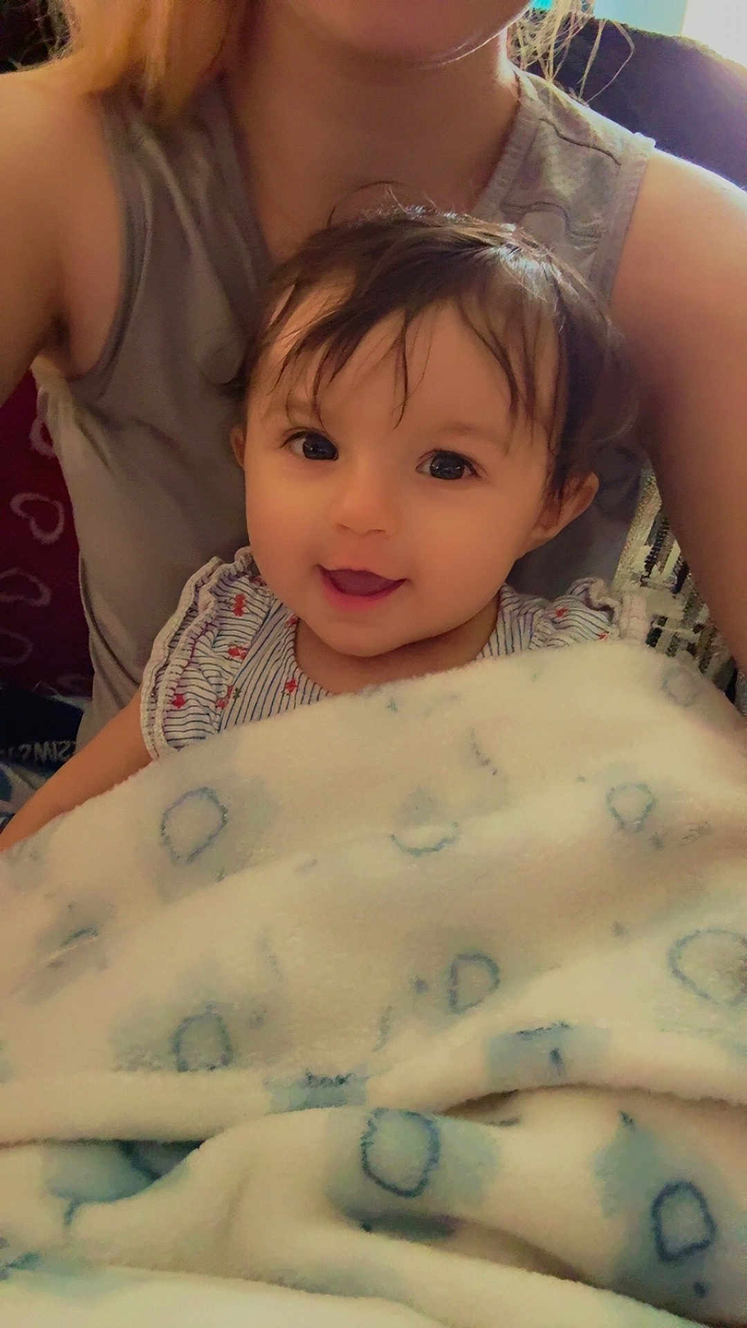 Mary joined the competition — help win amazing prizes! baby, blanket, child, closeup, clothing, comfort, cute, face, hair, happy, human, indoor, infant, person, portrait, seated, sleeveless, smiling, warm, young