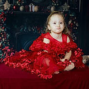Shayanna participe au concours pour gagner de l'argent avec cette photo : child, girl, red_dress, pout, sitting, holiday_decor, festive, portrait, cute, expression, indoor, decorations, christmas, celebration, smile, cute_face, young_child, fancy_dress, toddler, happy