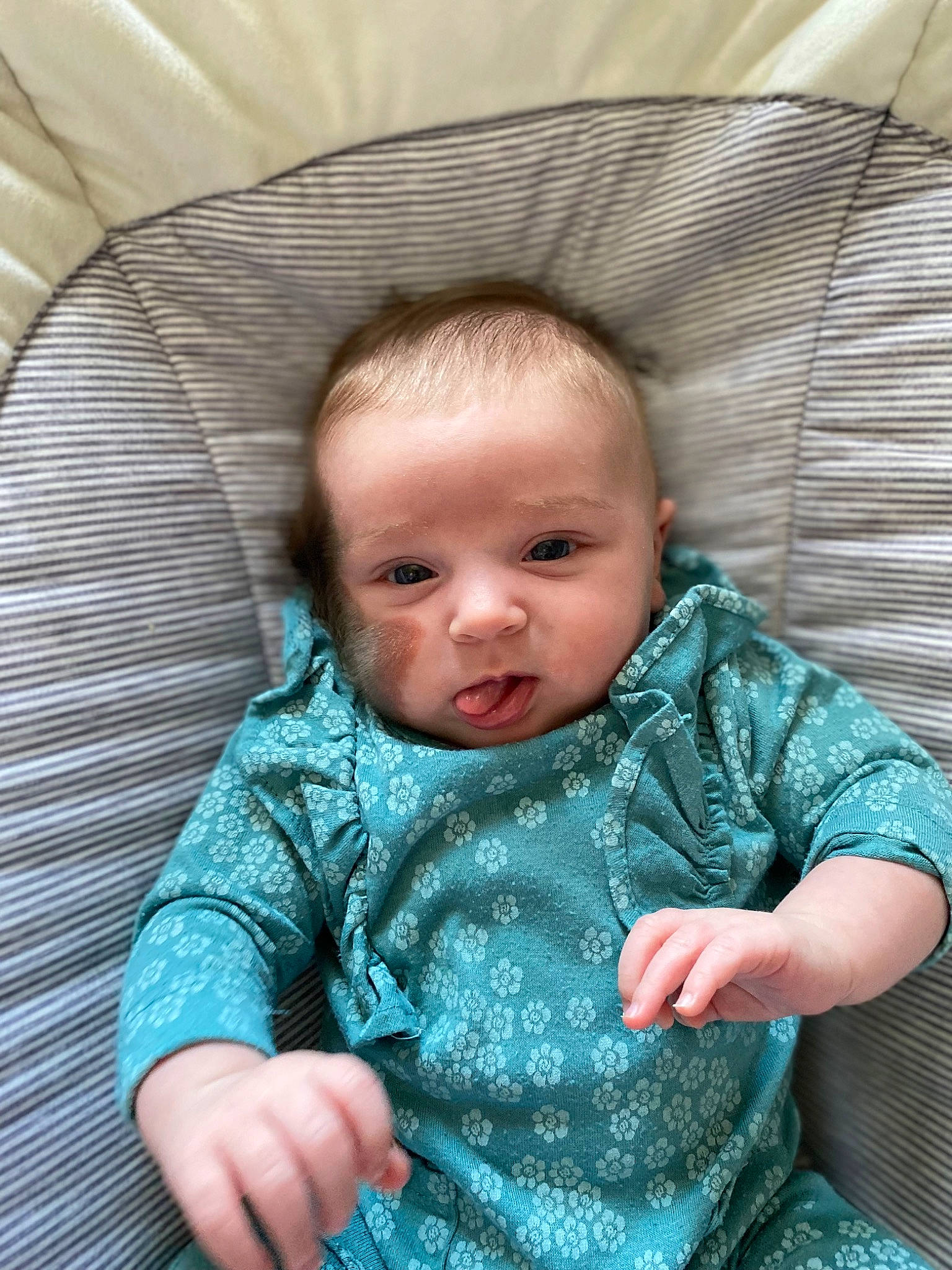 Rhiannon is registered to the contest to win money with this photo: baby, baby_products, baby_toddler_clothing, cheek, child, comfort, eye, face, facial_expression, gesture, hair, hairstyle, head, iris, mammal, mouth, person, sitting, skin, sleeve