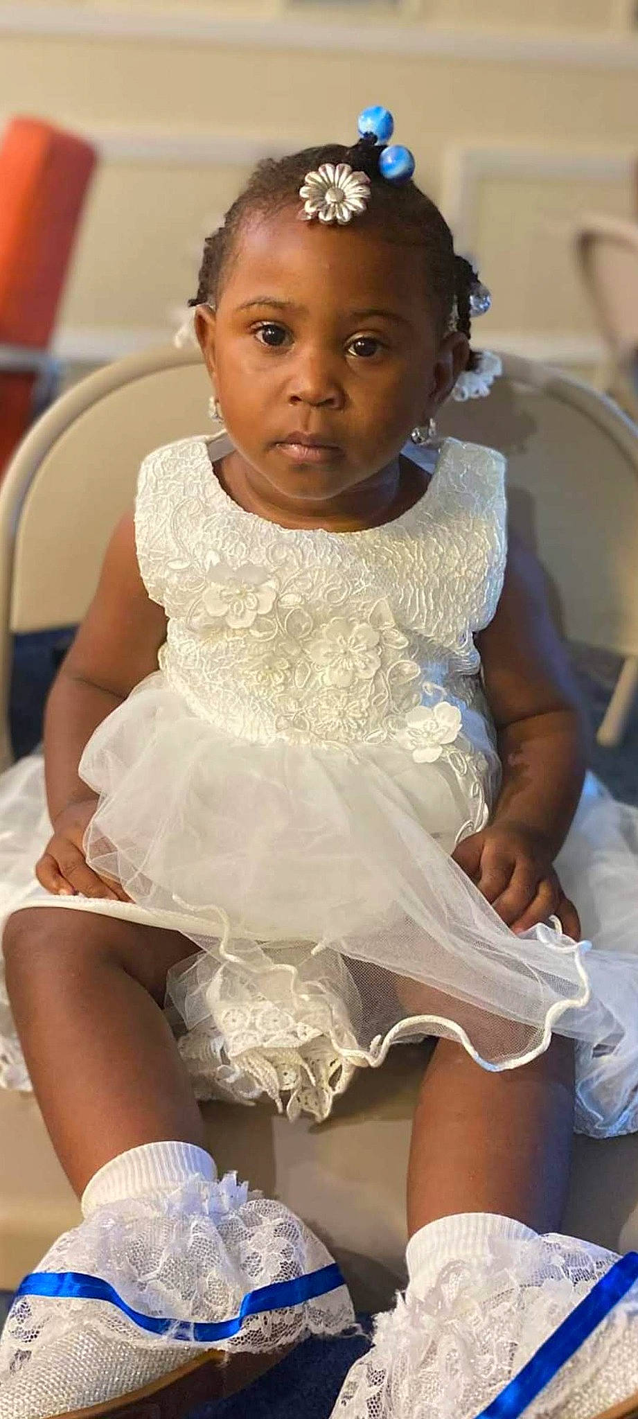 Aa'Khyah is registered to the contest to win money with this photo: black, chair, dress, embellishment, event, eye, flash_photography, formal_wear, fun, furniture, happy, iris, jewellery, necklace, person, sitting, skin, thigh, toddler, trunk