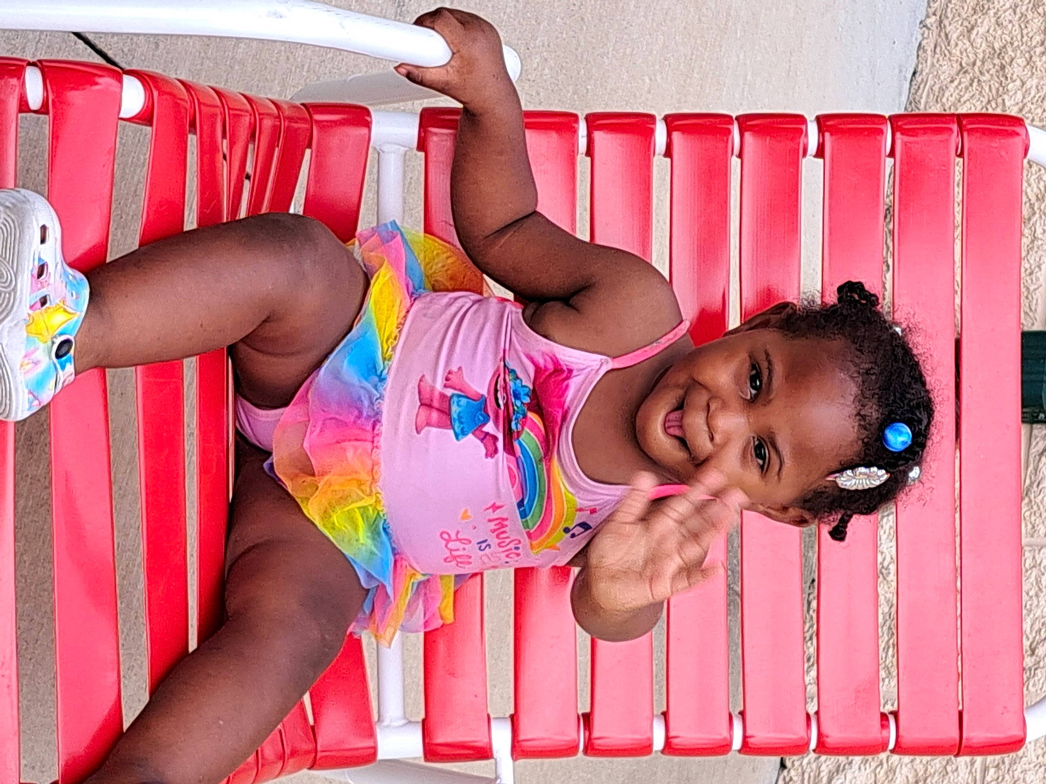 Aa'Khyah joined the competition — help win amazing prizes! barefoot, chest, clothing, foot, fun, happy, human_body, human_leg, leg, leisure, magenta, mouth, muscle, person, pink, red, smile, swimwear, thigh, trunk