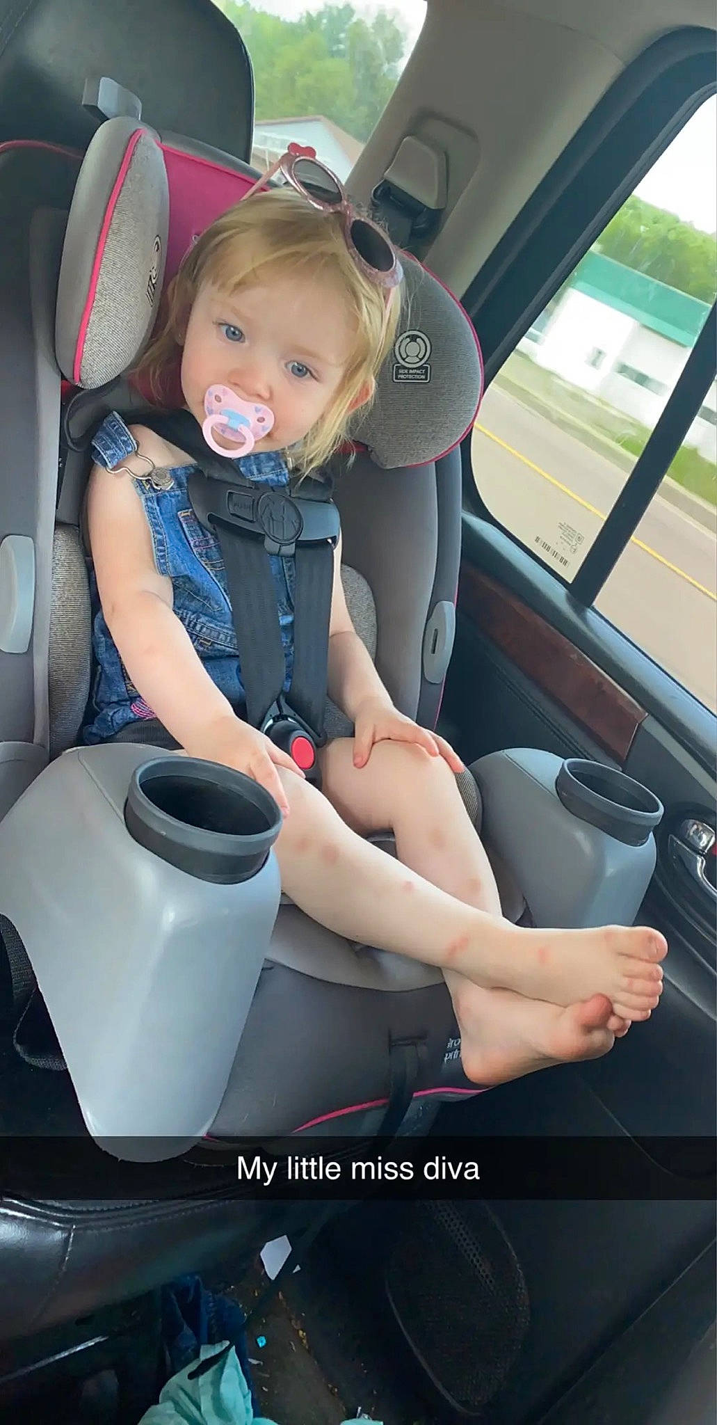 Novaleigh is registered to the contest to win money with this photo: auto_part, baby, baby_in_car_seat, car, car_seat, car_seat_cover, child, driving, family_car, leg, luxury_vehicle, person, sitting, steering_wheel, toddler, vacation, vehicle, vehicle_door