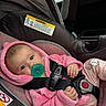 Charlotte joined the competition — help win amazing prizes! baby, car_seat, pink_hoodie, pacifier, infant, child, seatbelt, mickey_mouse, clothing, cute, portrait, indoors, car_interior, safety, closeup, face, hand, expression, comfort, babywear