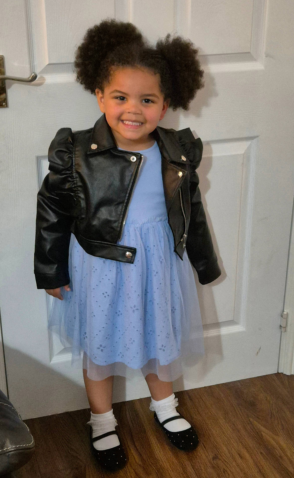 Aubrey is registered to the contest to win money with this photo: child, clothing, coat, face, female, footwear, girl, hair, happy, head, jacket, pants, person, photography, portrait, shoe, skirt, sleeve, smile, sneaker