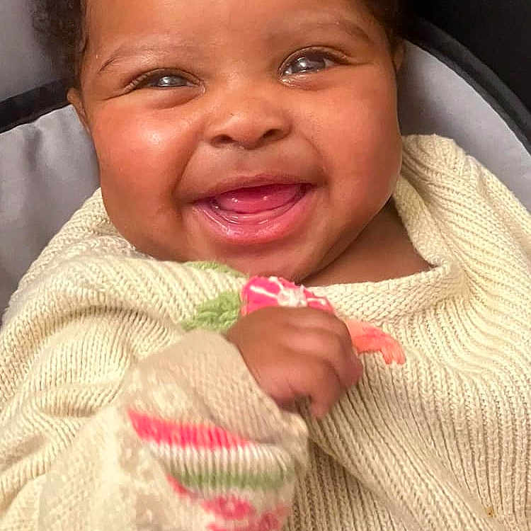Armiyah joined the competition — help win amazing prizes! baby, babylaughing, bodypart, clothing, cosmetics, face, happy, head, knitwear, laughing, lipstick, mouth, person, photography, portrait, smile, sweater, teeth