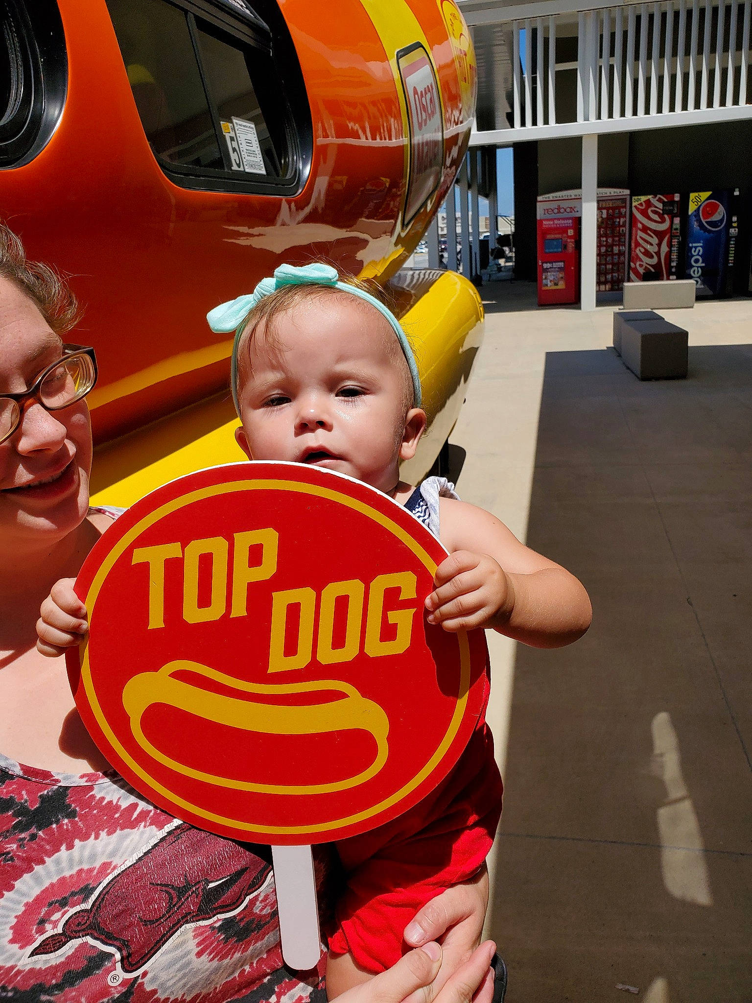 Emerald is registered to the contest to win money with this photo: car, child, family_car, fun, happy, person, red, toddler, vacation, vehicle, yellow