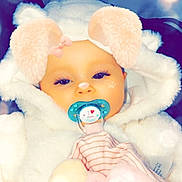 Ashley participe au concours pour gagner de l'argent avec cette photo : child, close_up, doll, ear, fun, girl, happiness, infant, nose, pink, skin, smile, stuffed_toy, teddy_bear, textile, toddler, toy