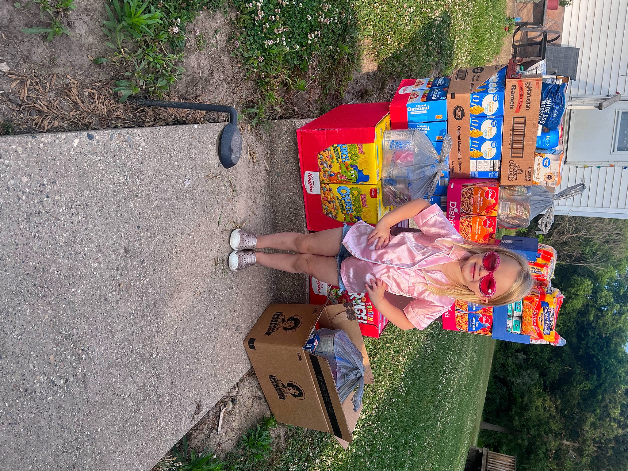 Bella Grace joined the competition — help win amazing prizes! art, asphalt, concrete, fun, grass, hat, joy, leisure, person, plant, road_surface, sidewalk, toddler, travel, tree, walking_shoe, window, world