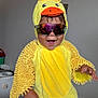 Duck joined the competition — help win amazing prizes! toddler, child, costume, yellow, duck, sunglasses, indoors, happy, smiling, plush, hood, orange, cute, person, funny, playful, fashion, portrait, clothing, baby