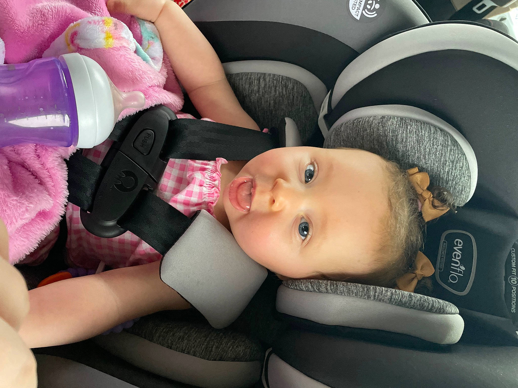 Kaia joined the competition — help win amazing prizes! auto_part, automotive_design, automotive_wheel_system, baby, baby_in_car_seat, baby_toddler_clothing, car_seat, cheek, child, comfort, eyelash, hat, human, mouth, nail, person, skin, steering_wheel, textile, toddler