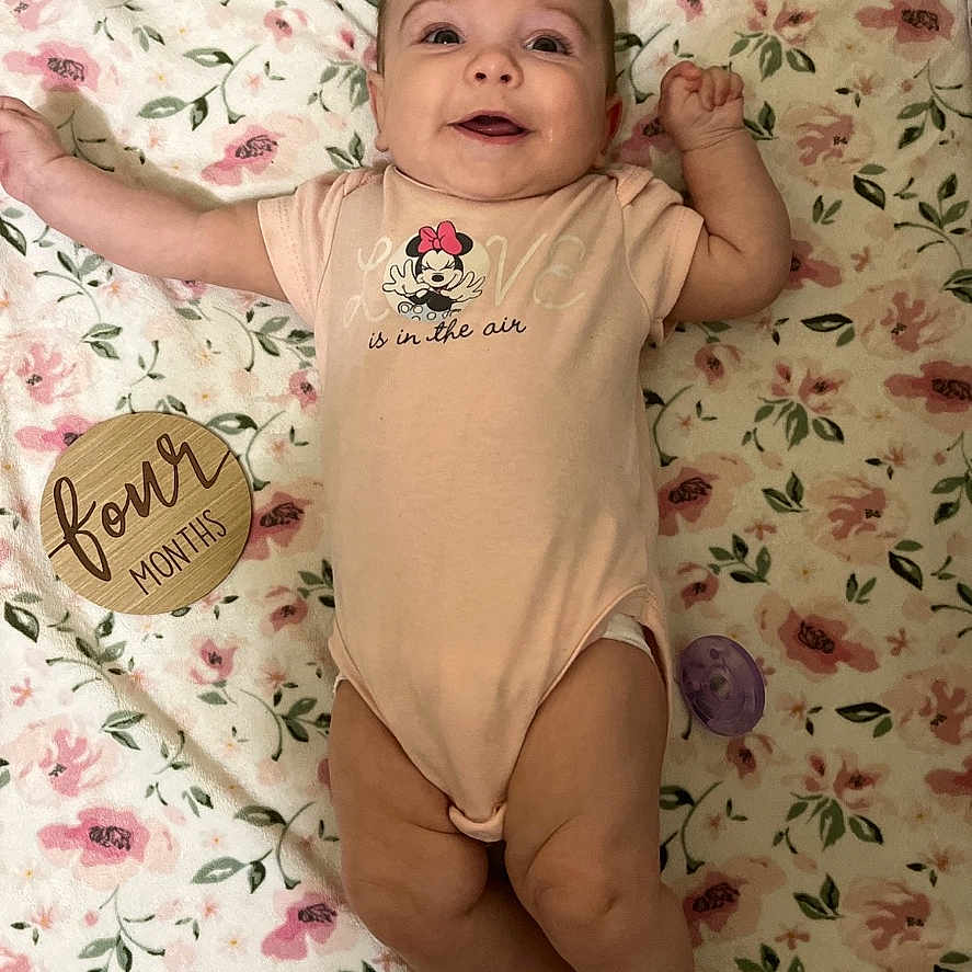 Madeline joined the competition — help win amazing prizes! baby, bed, bedroom, bodypart, clothing, cushion, face, finger, furniture, hand, head, homedecor, indoors, newborn, person, photography, portrait, quilt, room, t_shirt