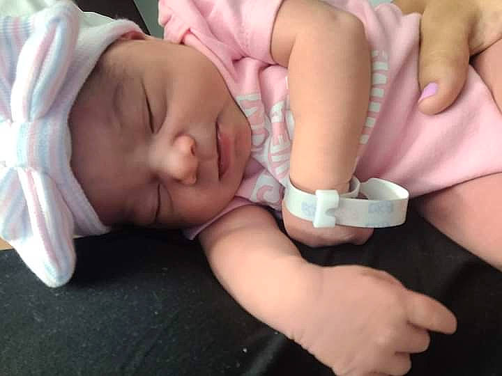 Arabella is registered to the contest to win money with this photo: baby, baby_products, baby_sleeping, baby_toddler_clothing, cheek, chest, child, comfort, ear, eyelash, finger, gesture, hand, headwear, mouth, nail, person, skin, thigh, thumb