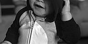 Nakoa joined the competition — help win amazing prizes! black, black_and_white, cap, child, cool, emotion, facial_expression, fun, girl, headgear, monochrome, monochrome_photography, person, photograph, photography, product, sitting, smile, snapshot, white