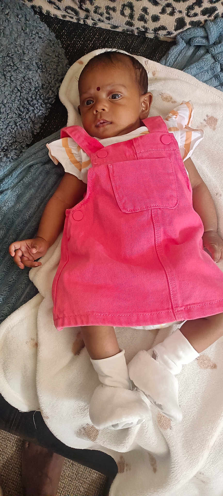 Janina joined the competition — help win amazing prizes! baby, infant, pink_dress, white_booties, blanket, soft_texture, indoor, portrait, child, newborn, lying_down, clothing, cute, cozy, face, person, small_hands, expression, relaxation, sleepwear