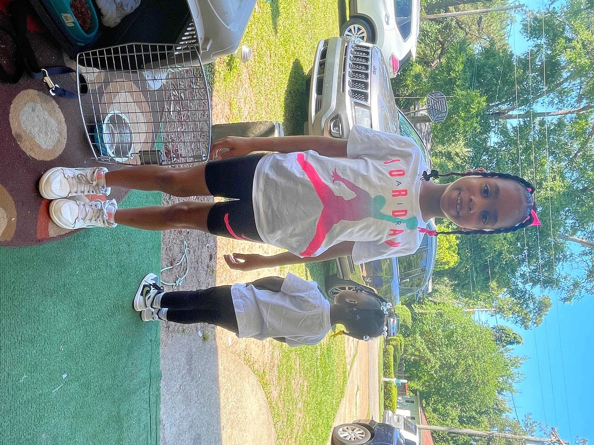 Kimora is registered to the contest to win money with this photo: fun, green, human_leg, joy, leisure, light, outdoor_shoe, person, plant, pole, recreation, shorts, sky, sneakers, t_shirt, travel, tree, walking_shoe, white