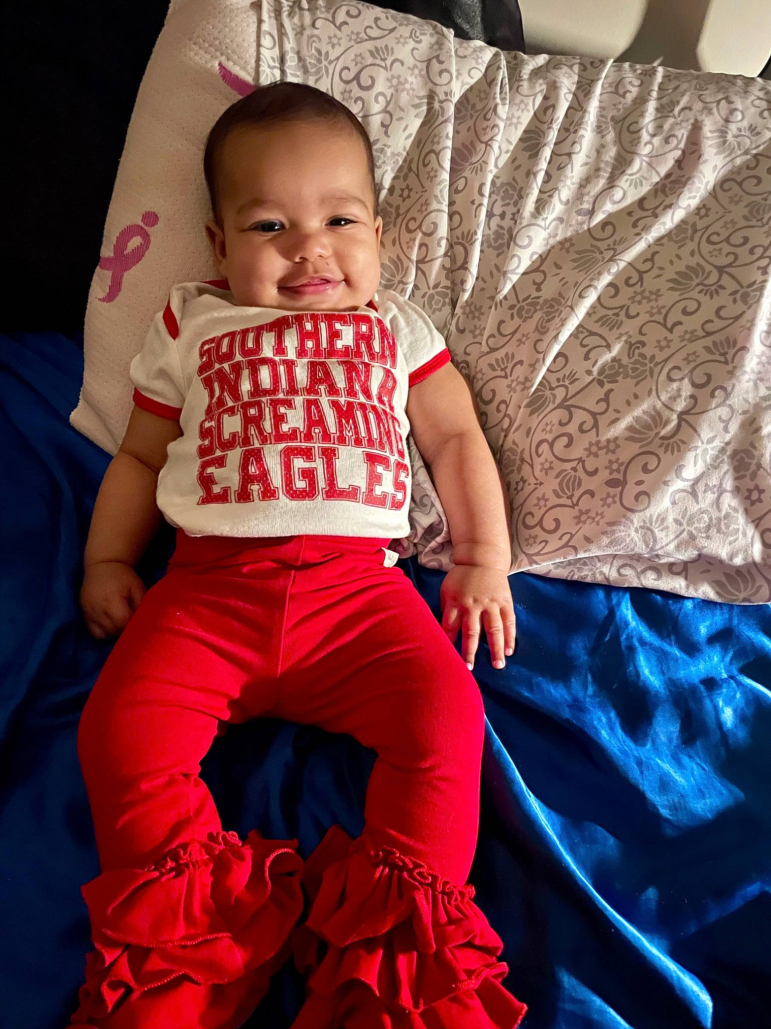 Azlyn joined the competition — help win amazing prizes! baby, baby_toddler_clothing, child, comfort, cool, couch, electric_blue, flash_photography, fun, happy, linens, magenta, pattern, person, product, sitting, sleeve, smile, t_shirt, textile