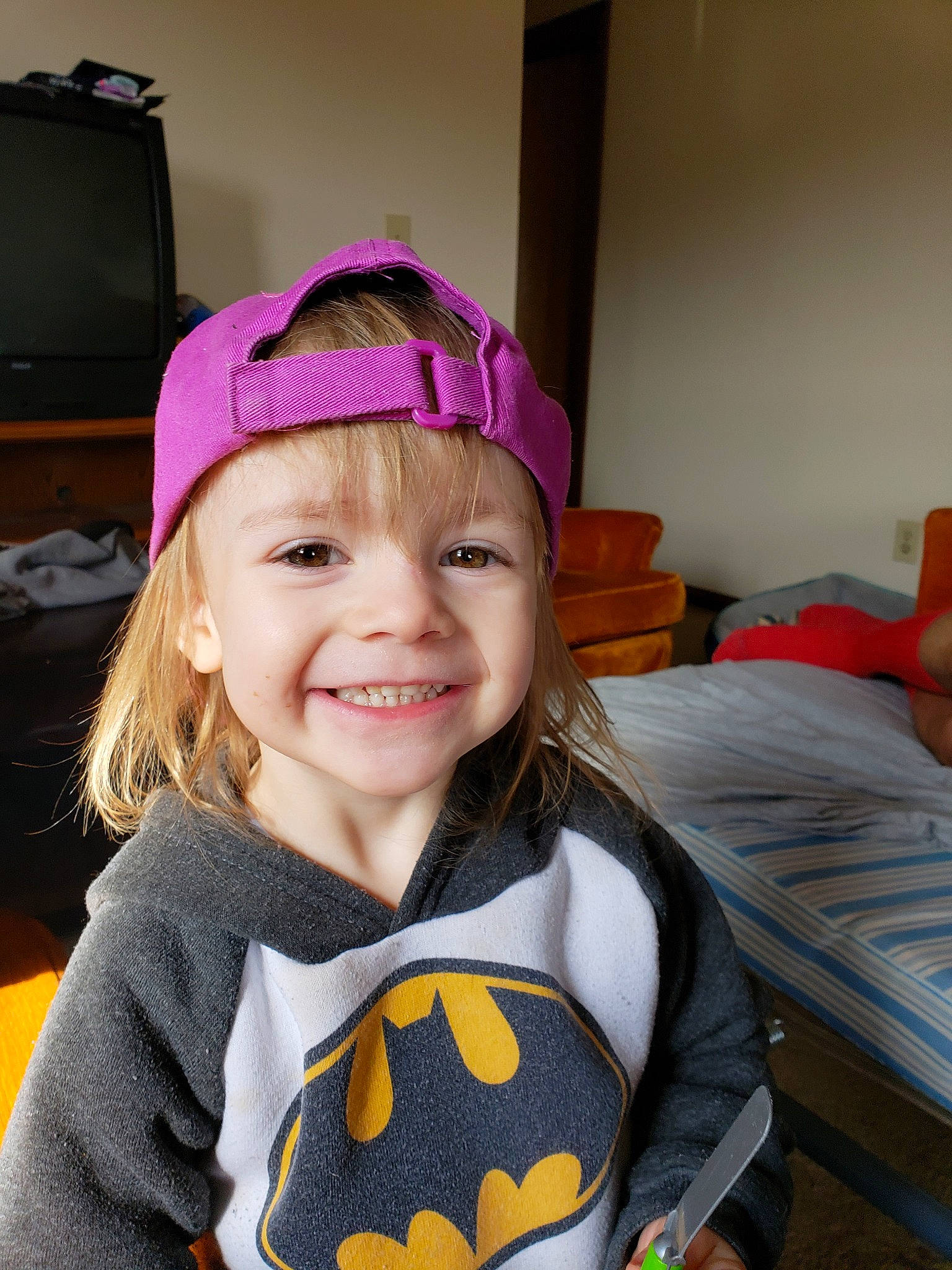 Charisma joined the competition — help win amazing prizes! ball, batman, child, costume, costume_accessory, ear, eye, face, fictional_character, hat, head, headgear, headwear, joy, person, purple, smile, toddler, trick_or_treat, yellow