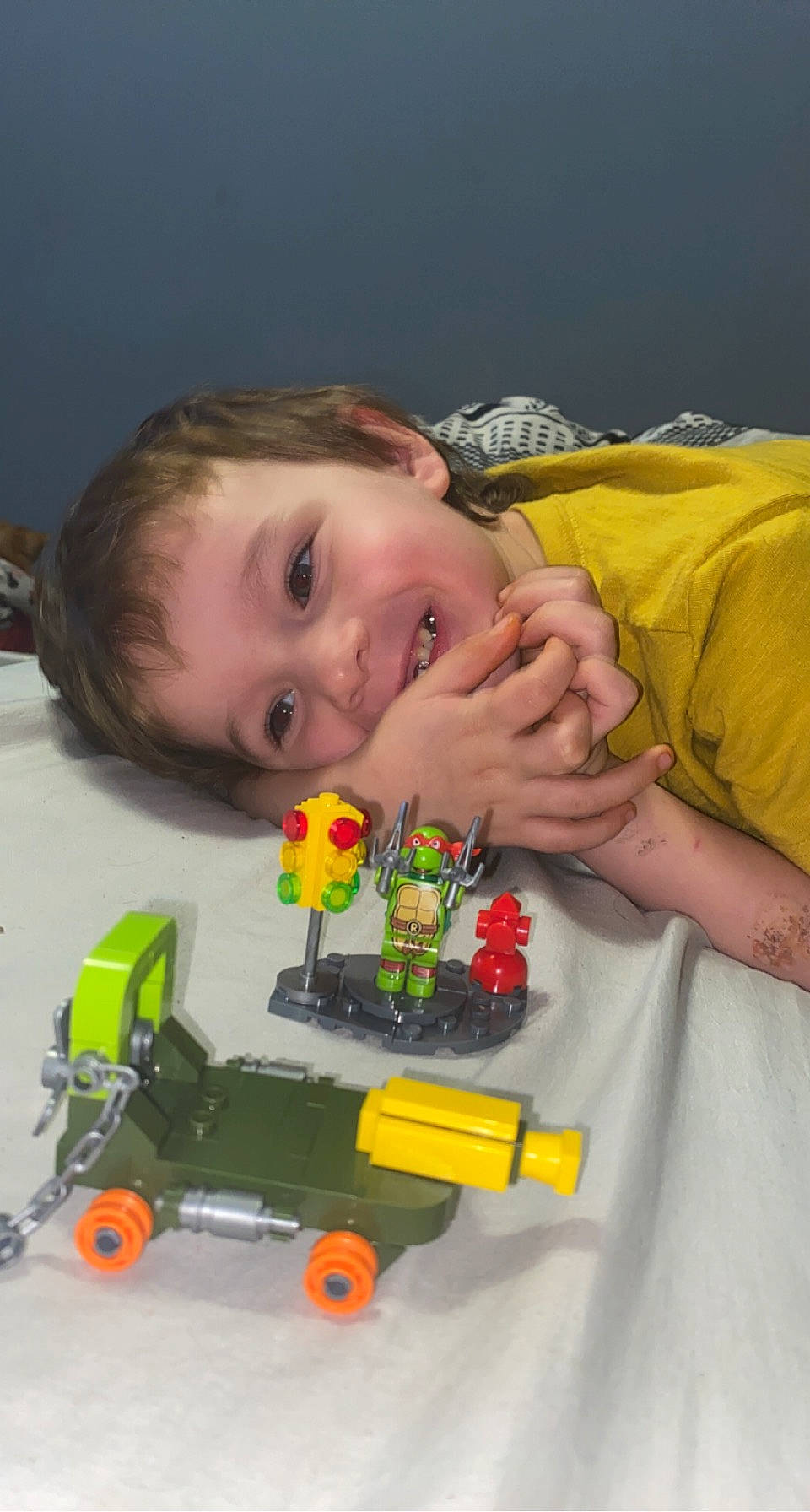 Landon joined the competition — help win amazing prizes! baby, baby_toddler_clothing, baby_toys, child, flooring, fun, happy, lego, machine, motor_vehicle, person, plastic, play, sitting, smile, toddler, toy, toy_block, toy_vehicle, vehicle