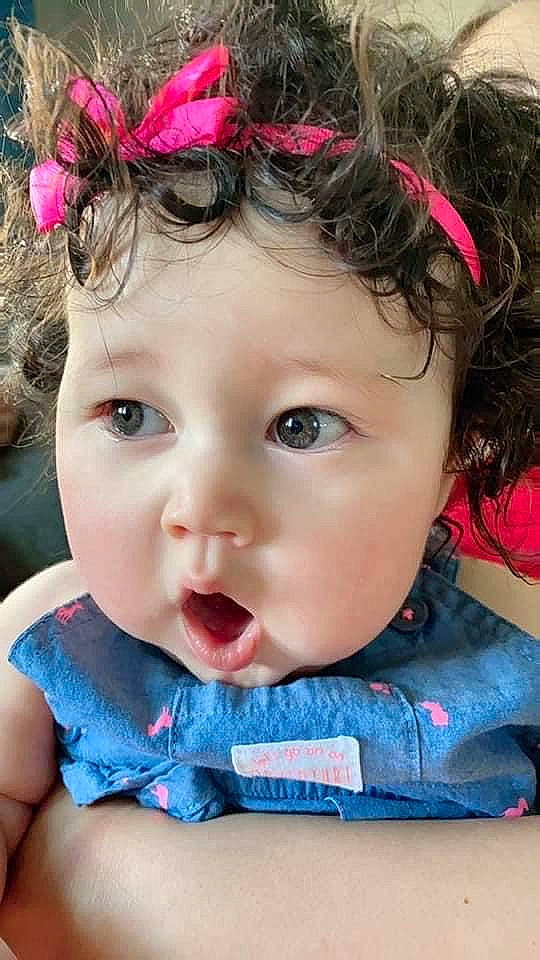 Liana joined the competition — help win amazing prizes! baby, brown_hair, cheek, child, child_model, chin, close_up, face, fashion_accessory, forehead, hair_accessory, head, headgear, headwear, lip, mouth, nose, person, photography, pink