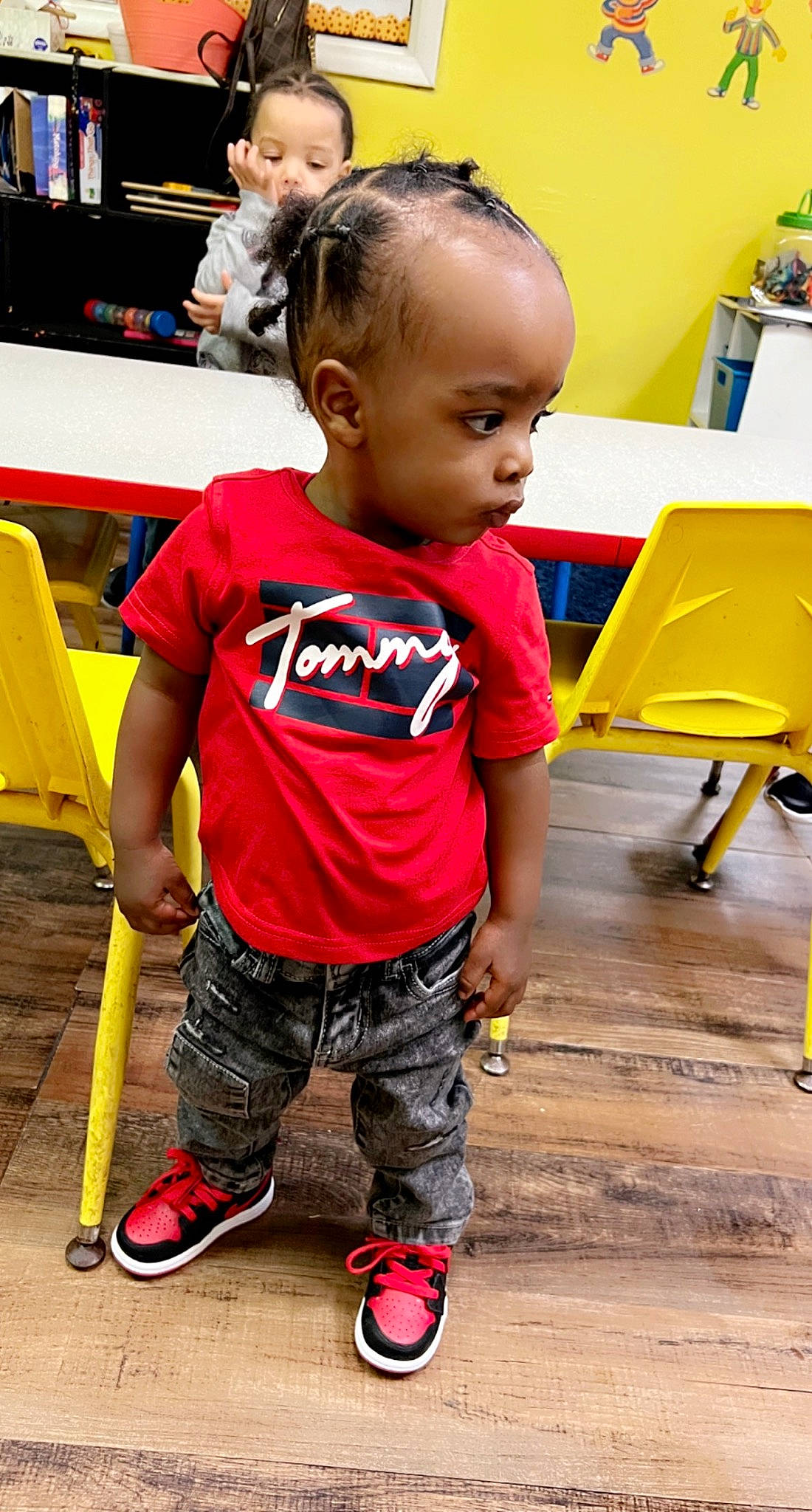 Zantrell joined the competition — help win amazing prizes! baby, chair, child, floor, flooring, fun, happy, leisure, person, play, recreation, room, sitting, sleeve, sneakers, standing, t_shirt, table, toddler, yellow