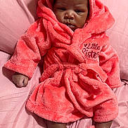 Delilah Dior Moore joined the competition — help win amazing prizes! baby, infant, child, pink, robe, hood, bow, slippers, soft, plush, cute, sleepwear, indoor, portrait, cozy, fabric, clothing, sitting, person, face