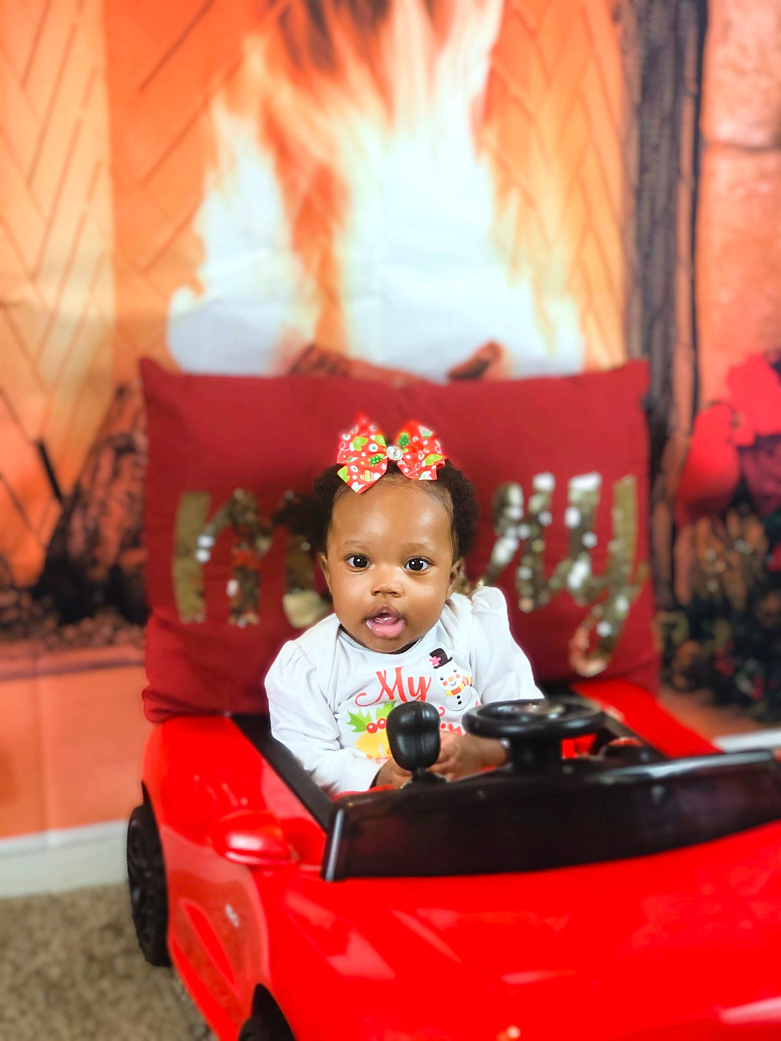 Dolapo is registered to the contest to win money with this photo: child, fun, person, red, toddler, vehicle