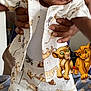 Dajon joined the competition — help win amazing prizes! baby, child, person, animal_print_clothing, blanket, teddy_bear_pattern, standing, adult_hand, footwear, sandals, animated_characters, lion_cubs, indoor, curious, cute, clothing, shorts, shirt, holding, portrait
