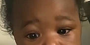Dajon joined the competition — help win amazing prizes! baby, child, face, curly_hair, blue_shirt, close_up, portrait, infant, person, skin, expression, indoors, young_child, head, cute, human, toddler, eyes, nose, mouth