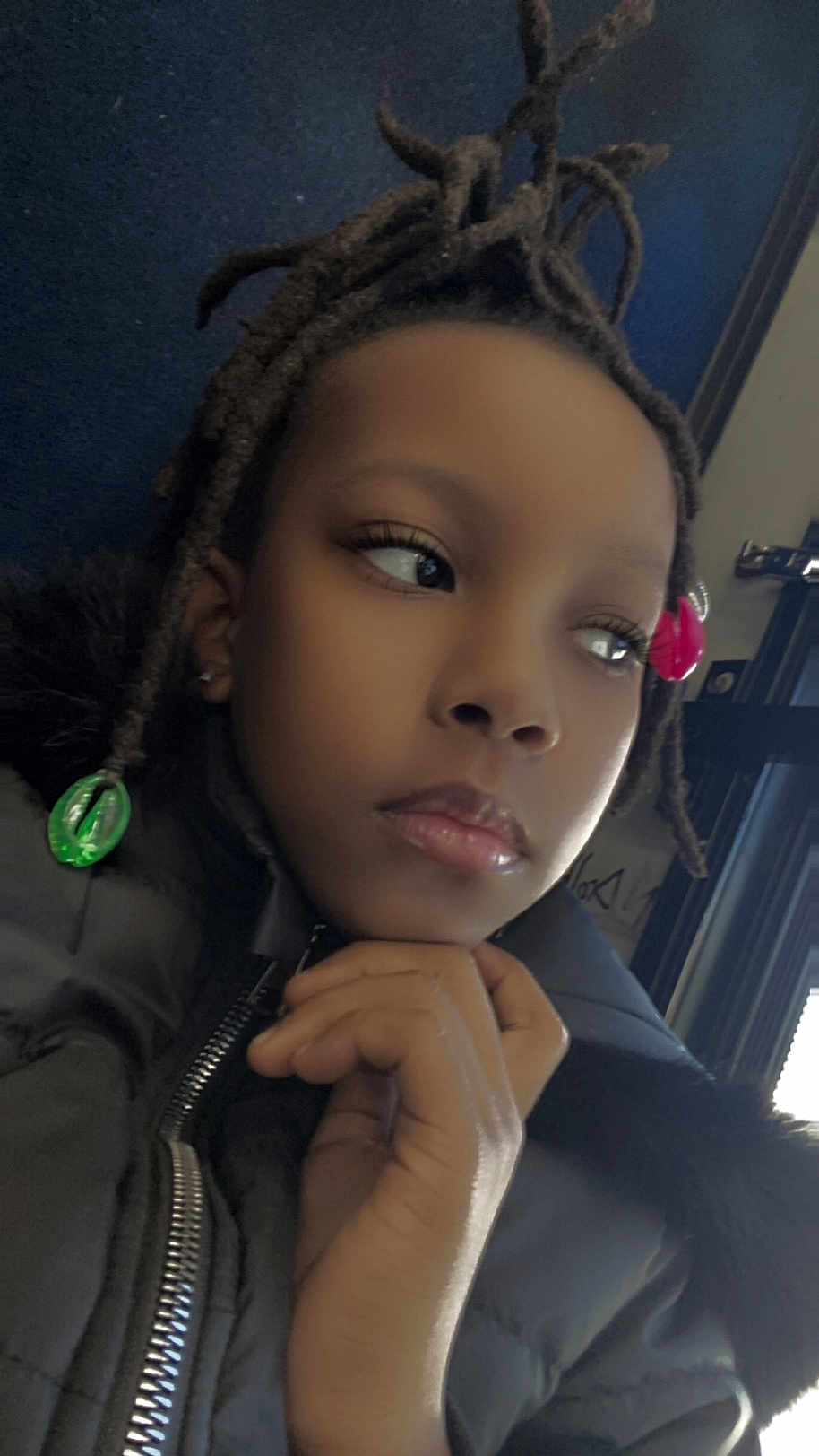 Wynnter-joy is registered to the contest to win money with this photo: accessories, bodypart, child, clothing, coat, earring, face, female, finger, gemstone, girl, hair, hand, head, jacket, jewelry, mouth, person, photography, portrait