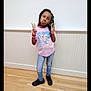 Wynnter-joy is registered to the contest to win money with this photo: bodypart, child, clothing, face, female, finger, footwear, hand, hardwood, head, indoors, interiordesign, jeans, pants, person, photography, portrait, shoe, t_shirt, wood