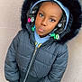 Wynnter-joy is registered to the contest to win money with this photo: blackhair, clothing, coat, face, hair, head, hood, jacket, knitwear, person, sitting, sleeve, standing, student, sweater, sweatshirt
