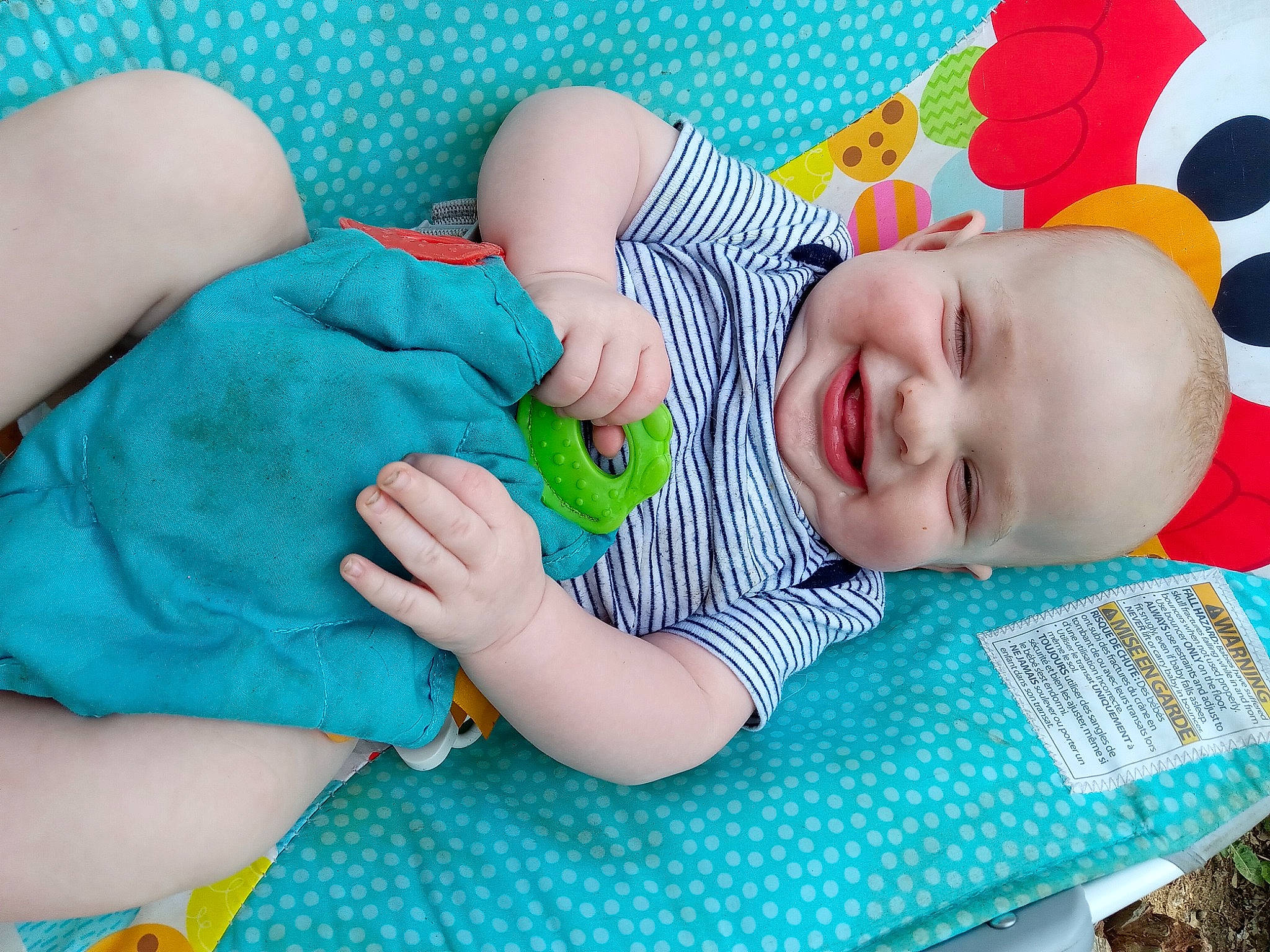 Henry joined the competition — help win amazing prizes! arm, baby, baby_products, baby_toddler_clothing, blue, cheek, child, comfort, electric_blue, finger, green, hand, happy, joy, linens, pattern, person, skin, sleeve, smile
