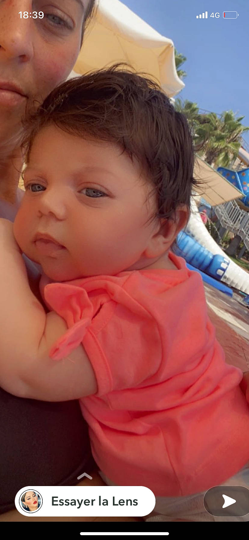 Ova participe au concours pour gagner de l'argent avec cette photo : baby, baby_toddler_clothing, child, eyelash, fun, grass, happy, leisure, mouth, nose, person, play, recreation, sand, sitting, skin, sky, toddler, tree, vacation