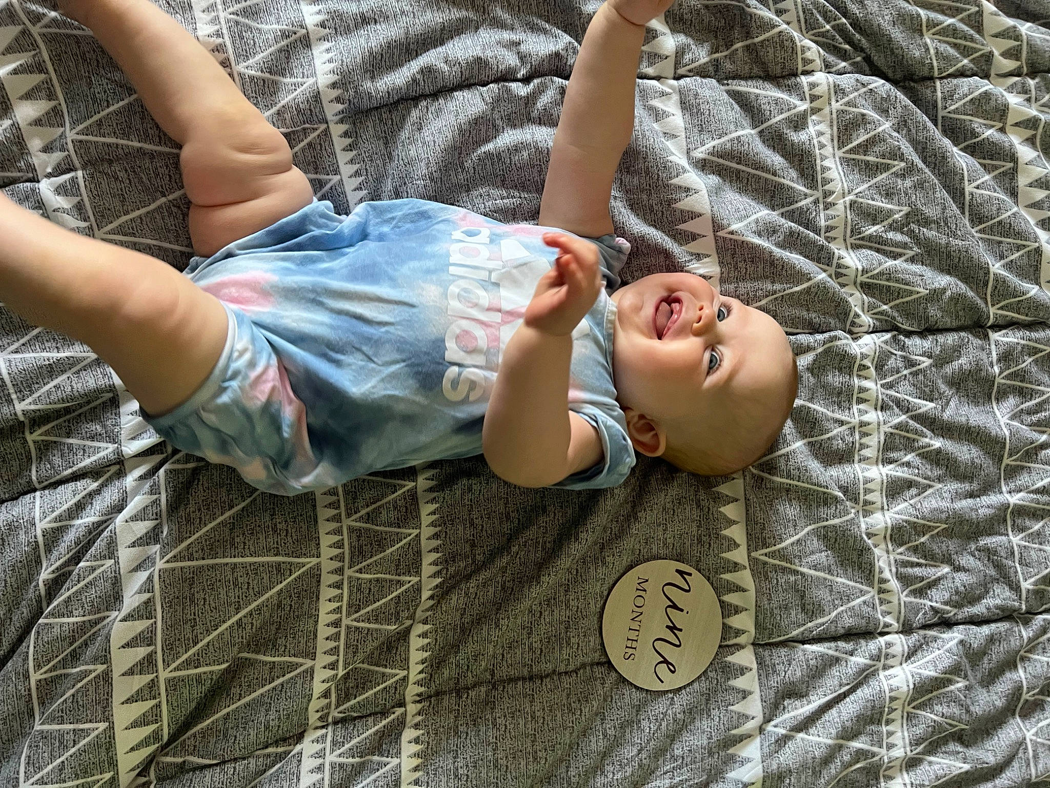 Adalee joined the competition — help win amazing prizes! child, comfort, denim, elbow, fun, gesture, grass, happy, human_body, human_leg, knee, leg, leisure, pattern, person, sitting, smile, t_shirt, textile, thigh