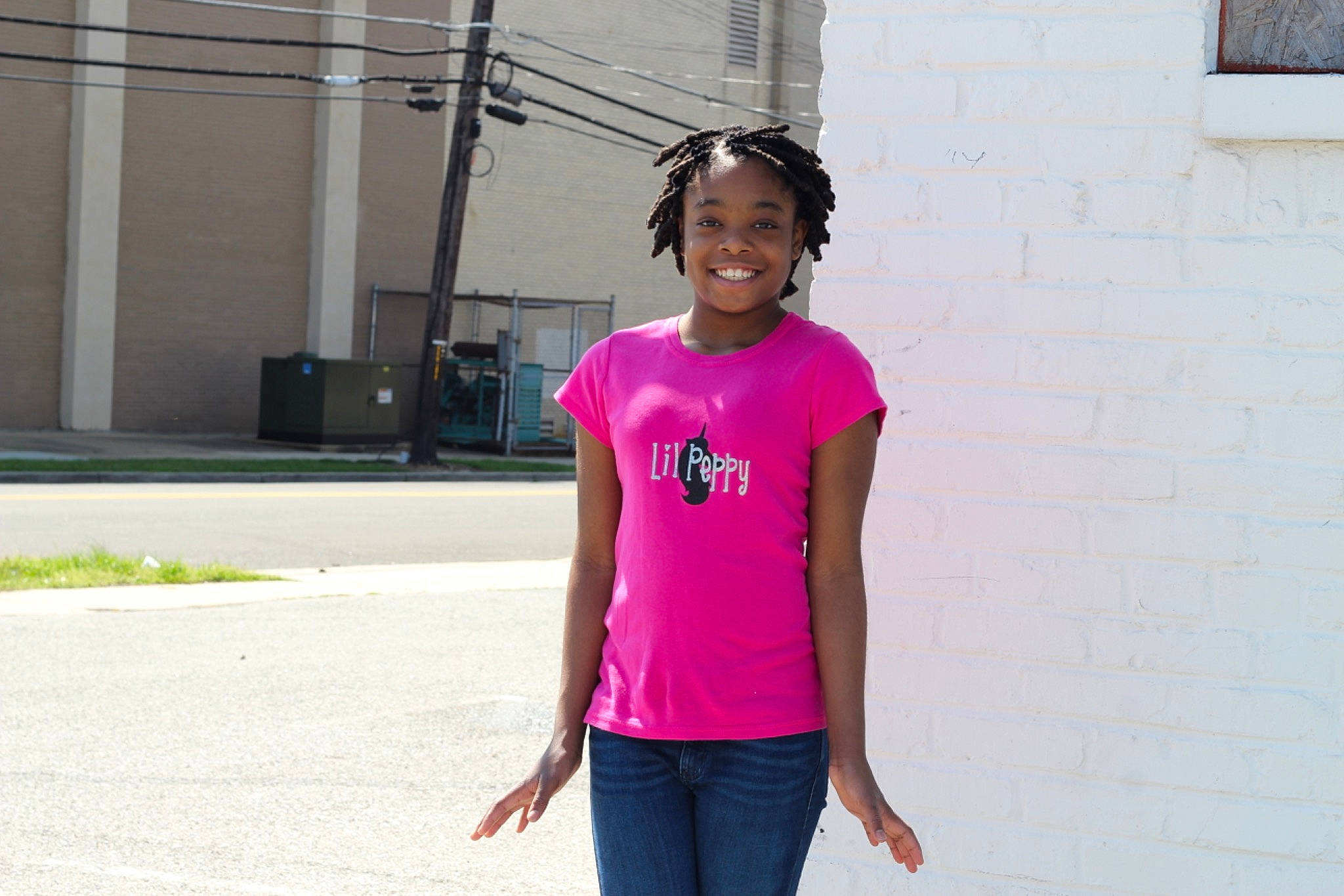 Jaliah is registered to the contest to win money with this photo: child, clothing, fun, joint, joy, magenta, neck, outerwear, person, pink, shirt, shoulder, sleeve, smile, style, t_shirt, top, vacation