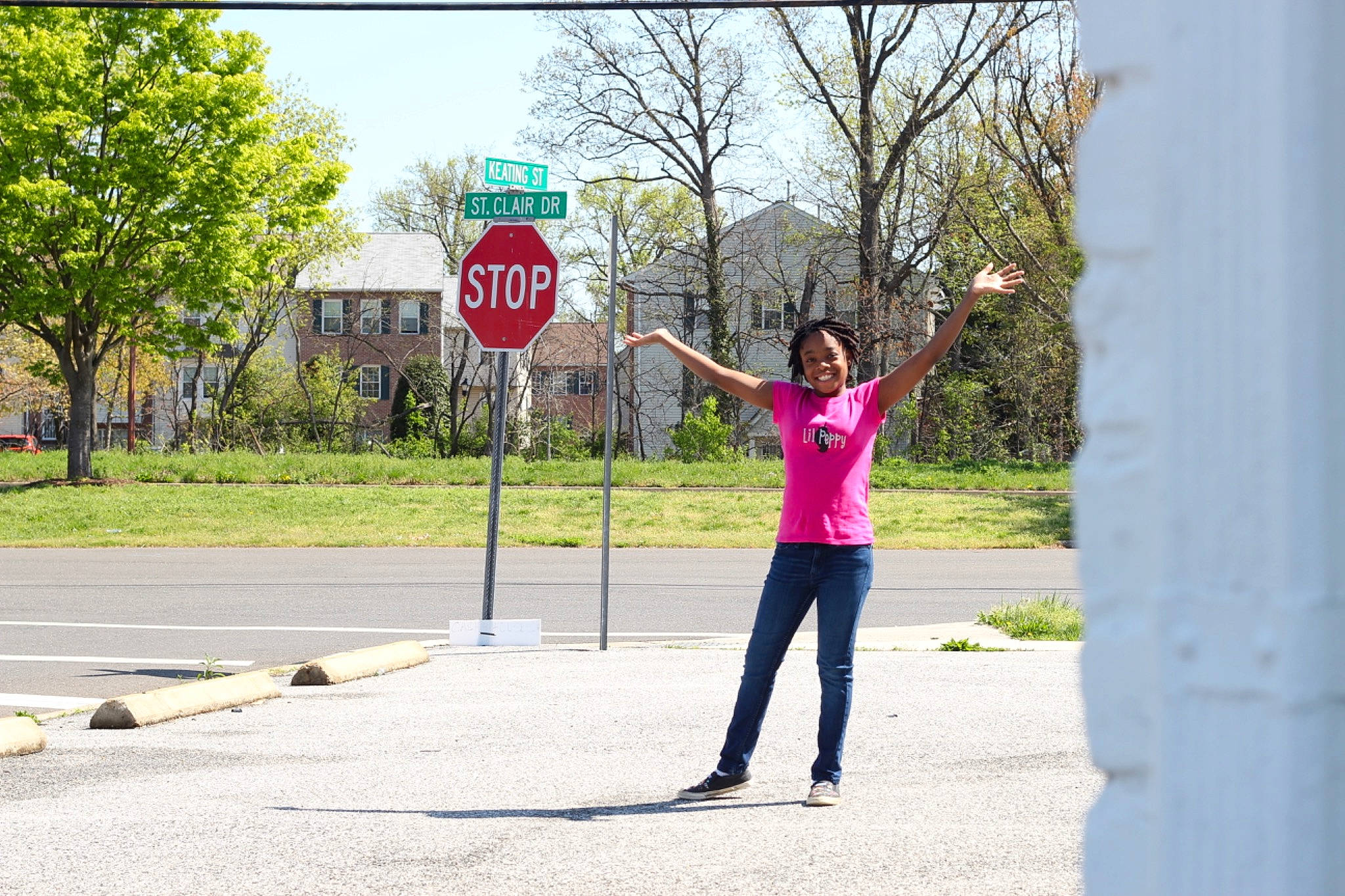 Jaliah is registered to the contest to win money with this photo: asphalt, fun, games, joy, leisure, pedestrian, person, recreation, road, sign, signage, street, traffic_sign, tree, vacation, walking