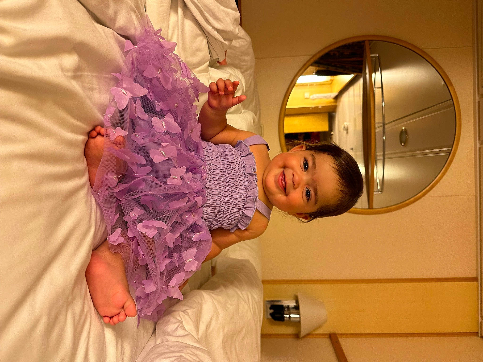 Legacy is registered to the contest to win money with this photo: baby, baby_products, baby_toddler_clothing, child, circle, comfort, event, fun, happy, hat, joy, linens, magenta, person, pink, purple, room, smile, toddler, violet