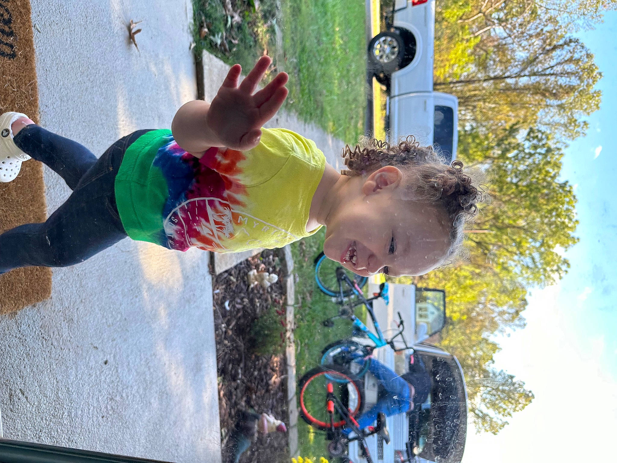 Tariah joined the competition — help win amazing prizes! bicycle_wheel, child, electric_blue, fun, grass, green, happy, leisure, outdoor_play_equipment, person, plant, play, recreation, shorts, sky, t_shirt, tire, toddler, tree, wheel