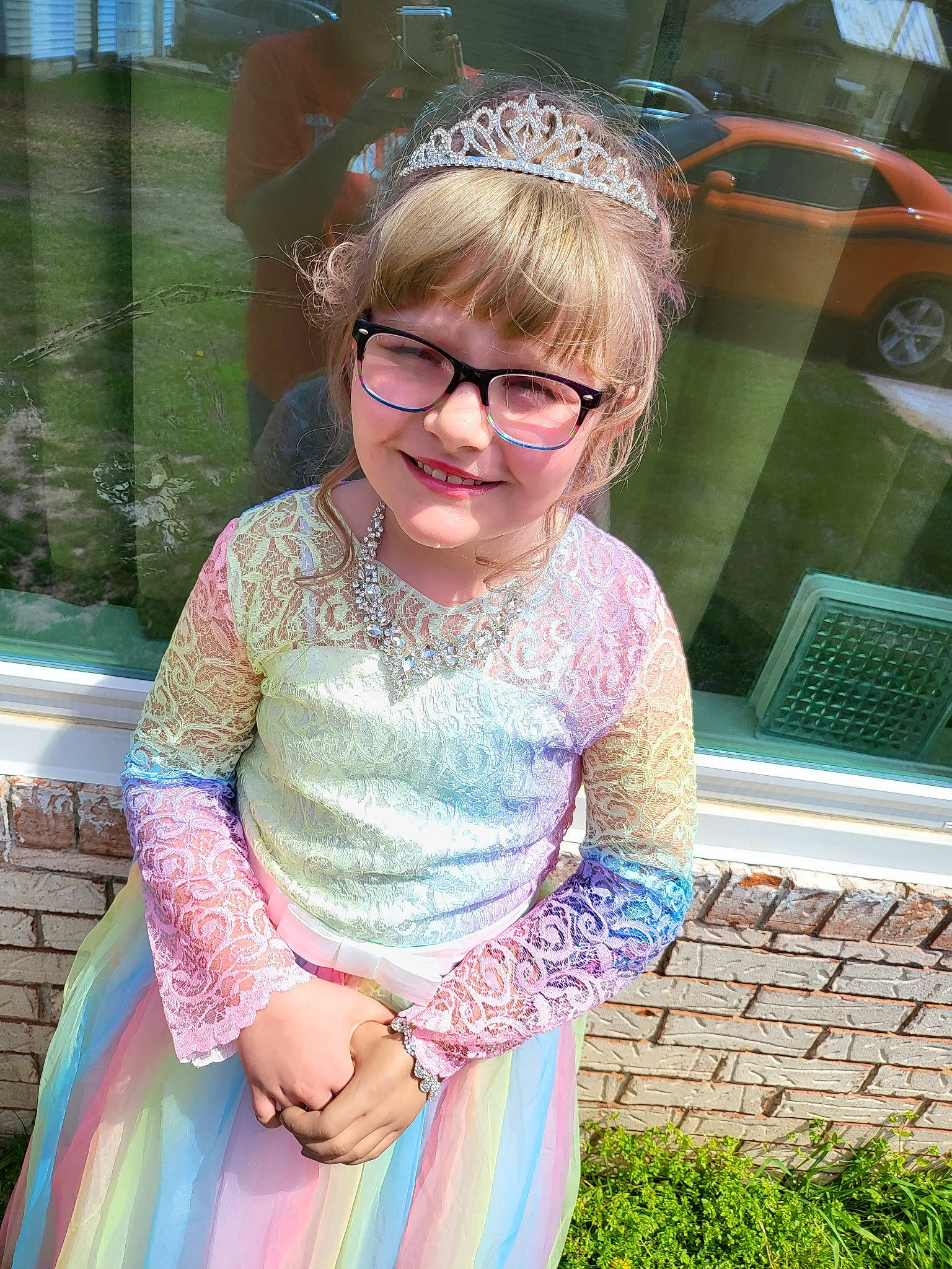 Aspen is registered to the contest to win money with this photo: baby_toddler_clothing, child, day_dress, dress, embellishment, event, eyewear, fun, glasses, grass, green, happy, joy, magenta, one_piece_garment, person, pink, sleeve, smile, summer