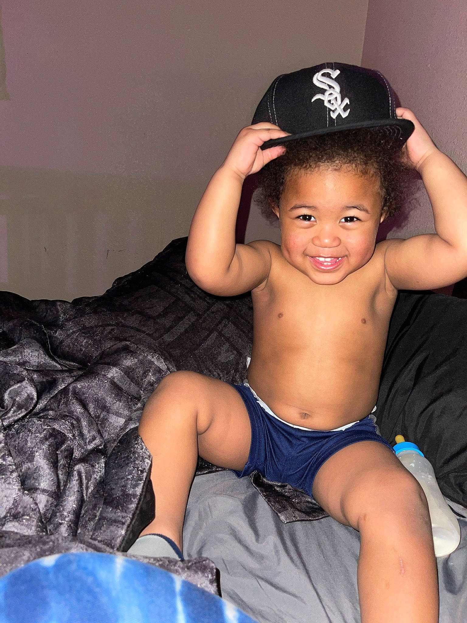 Aayan is registered to the contest to win money with this photo: arm, black_hair, cap, chest, comfort, cool, elbow, flash_photography, fun, happy, hat, human_body, joy, knee, leg, mouth, muscle, person, shorts, smile