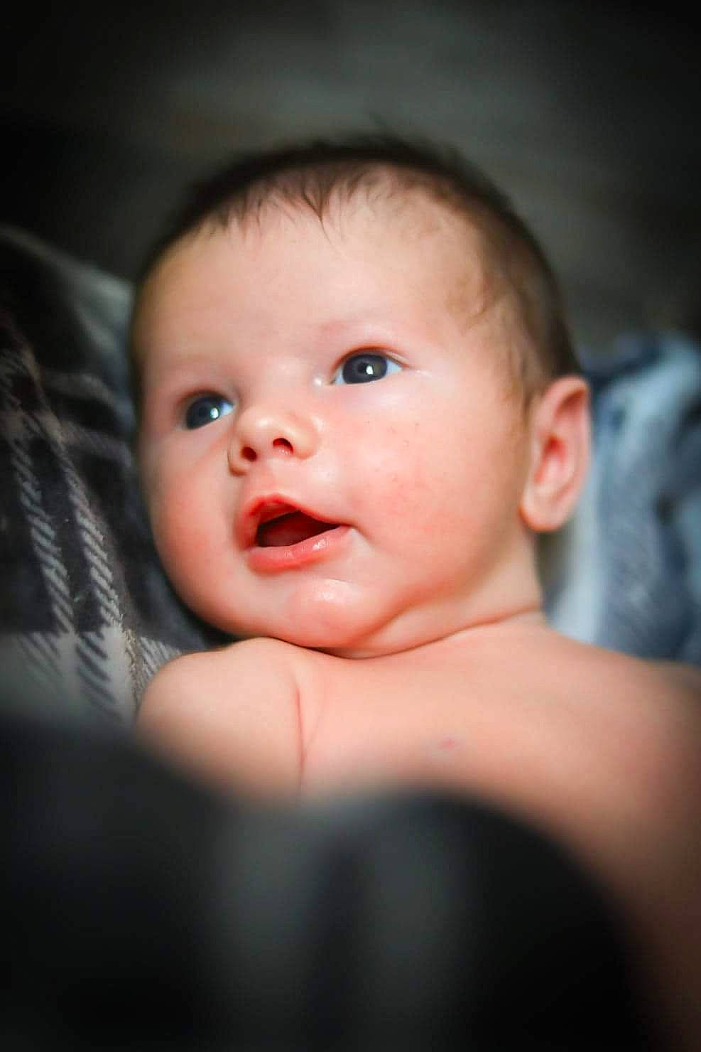 Carsyn joined the competition — help win amazing prizes! baby, baby_toddler_clothing, black_hair, cheek, child, comfort, darkness, ear, eyelash, flash_photography, flesh, flooring, happy, lip, nose, person, portrait, portrait_photography, sitting, smile